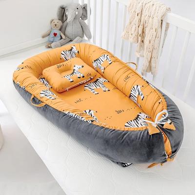 reducteur de lit bebe nid réglable adorable