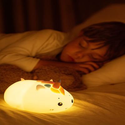 veilleuse licorne multifonction enfant couché paisiblement