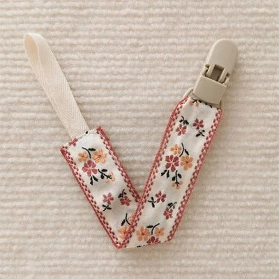 attache tetine chaine de sucette brun orange