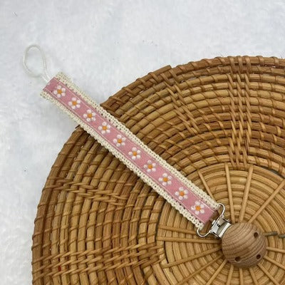 attache tetine pendentif rose