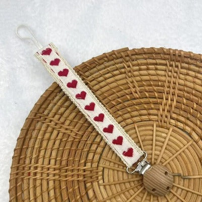 attache tetine pendentif rouge