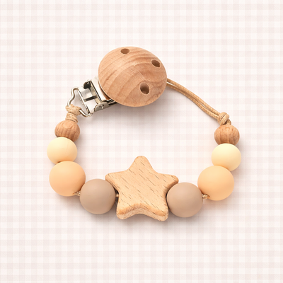 attache tetine perle ronde jaune