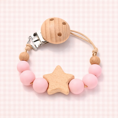 attache tetine perle ronde rose