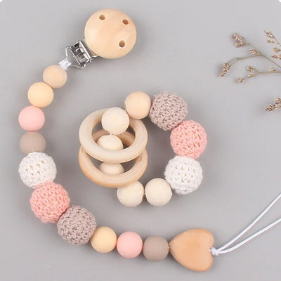 attache tétine perles rose