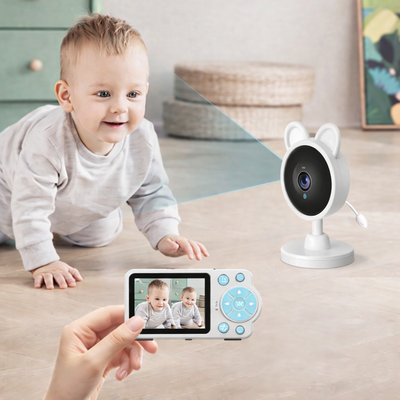 babyphone caméra sécuritaire blanc bébé s'amuse
