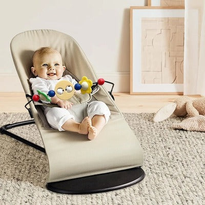 balancelle bebe berceuse sérénité beige enfant souriant