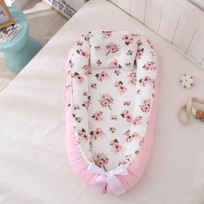 bebe cocon koko fleurs roses apaisant