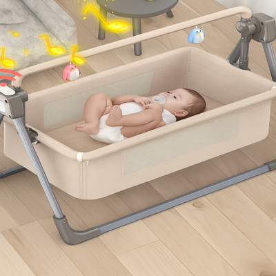 cododo beige à bascule bébé couché