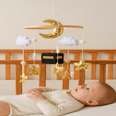 mobile lit bébé ludique lune noire bébé allongé