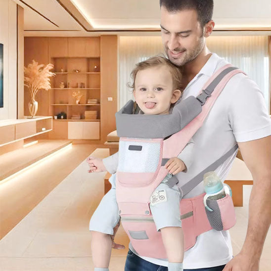 porte bebe ergonomique papa tient enfant