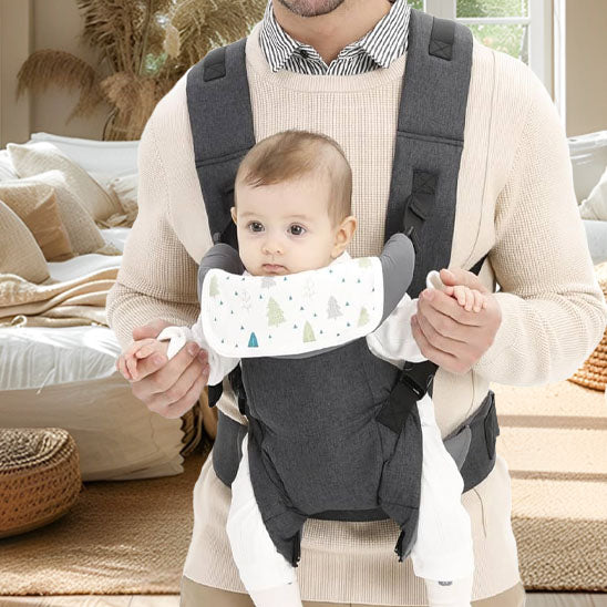 porte bébé nouveau né enfant et papa au salon