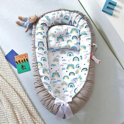 réducteur de lit bébé cocon d'or doux