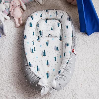 réducteur de lit bébé portable confortable
